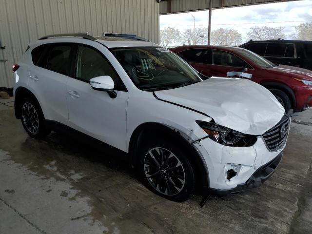 Photo 4 from auction – 2016 MAZDA CX-5 GT with VIN JM3KE2DY2G0753844