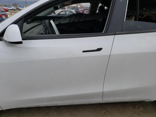 Photo 7 from auction – 2022 TESLA MODEL Y with VIN 7SAYGAEE8NF342297