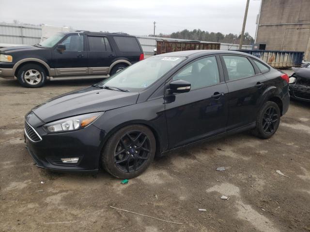 FORD FOCUS SE 2016 with VIN 1FADP3F23GL264867 - Photo from auction