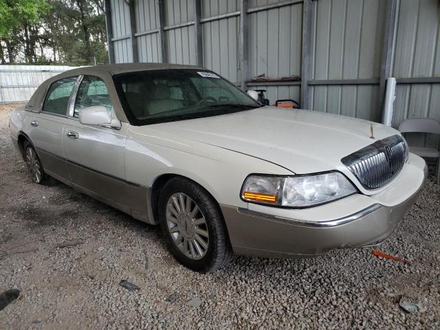 Photo 4 from auction – 2004 LINCOLN TOWN CAR E with VIN 1LNHM81W44Y662062