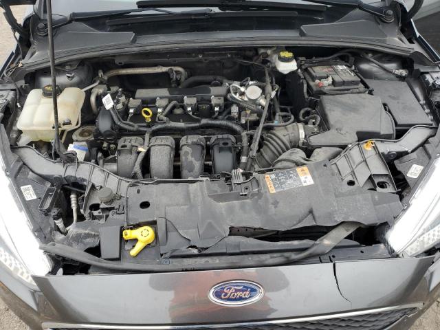 Photo 11 from auction – 2017 FORD FOCUS SE with VIN 1FADP3F28HL324661