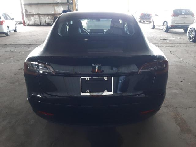 Photo 6 from auction – 2021 TESLA MODEL 3 with VIN 5YJ3E1EA2MF030355