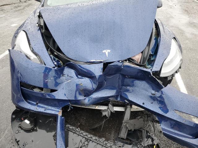 Photo 11 from auction – 2022 TESLA MODEL 3 with VIN 5YJ3E1EB5NF159541