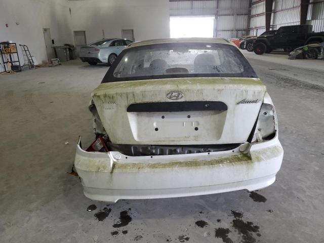 Photo 6 from auction – 2004 HYUNDAI ACCENT L with VIN KMHCF35C24U311603