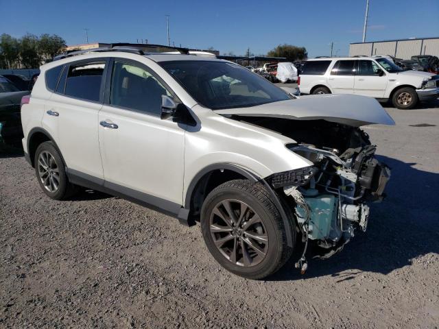 Photo 4 from auction – 2018 TOYOTA RAV4 LIMIT with VIN JTMYFREV9JJ204656
