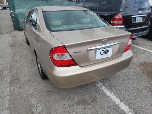 Photo 3 from auction – 2002 TOYOTA CAMRY LE with VIN 4T1BF30K72U008856