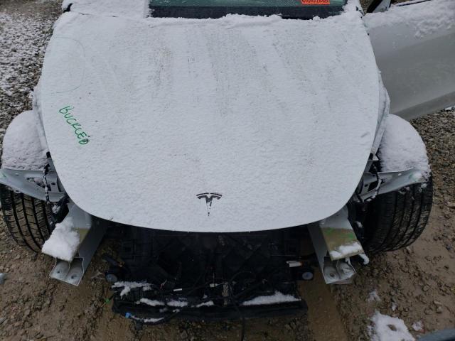 Photo 11 from auction – 2021 TESLA MODEL Y with VIN 5YJYGDEE3MF106279