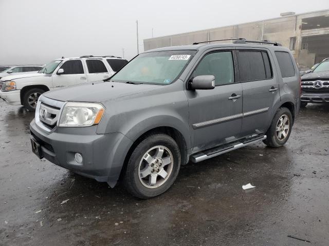 HONDA PILOT TOUR 2011 с VIN 5FNYF4H96BB015585 - Фото с аукциона