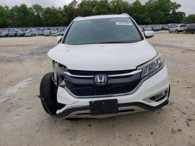 Photo 5 from auction – 2016 HONDA CR-V TOURI with VIN 5J6RM3H95GL008338