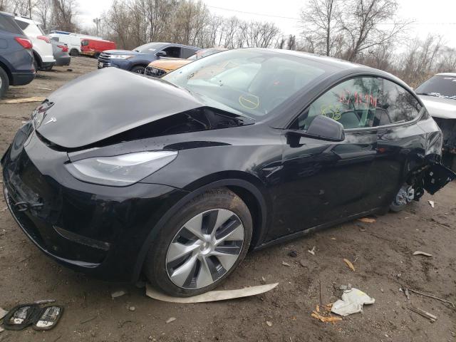 TESLA MODEL Y 2023 with VIN 7SAYGDEE5PF597686 - Photo from auction
