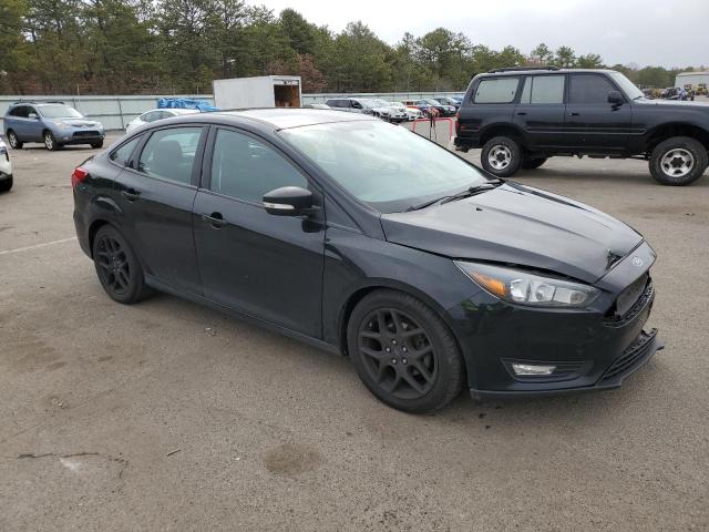 Photo 4 from auction – 2016 FORD FOCUS SE with VIN 1FADP3FE0GL354231