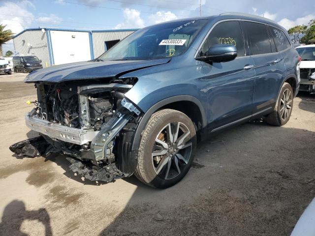 HONDA PILOT TOUR 2021 with VIN 5FNYF5H61MB035404 - Photo from auction