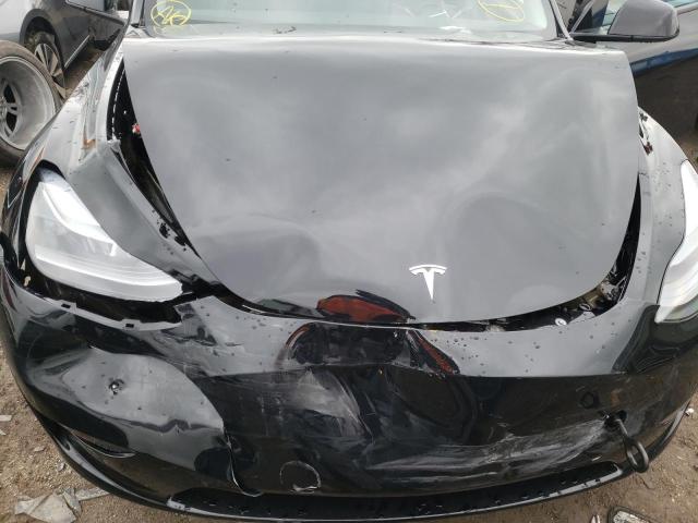 Photo 11 from auction – 2023 TESLA MODEL Y with VIN 7SAYGDEE5PF597686