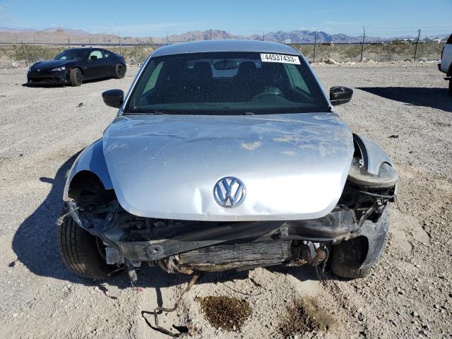 Photo 5 from auction – 2013 VOLKSWAGEN BEETLE with VIN 3VWFP7AT0DM655993