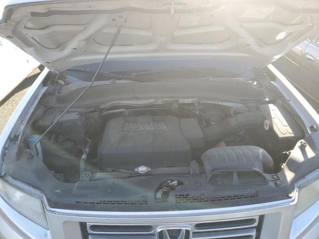 Photo 12 from auction – 2006 HONDA RIDGELINE with VIN 2HJYK16536H524331