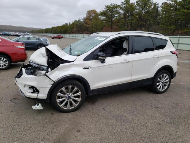 FORD ESCAPE TIT 2017 with VIN 1FMCU9J92HUC83438 - Photo from auction