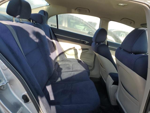 Photo 10 from auction – 2006 HONDA CIVIC HYBR with VIN JHMFA36296S026898