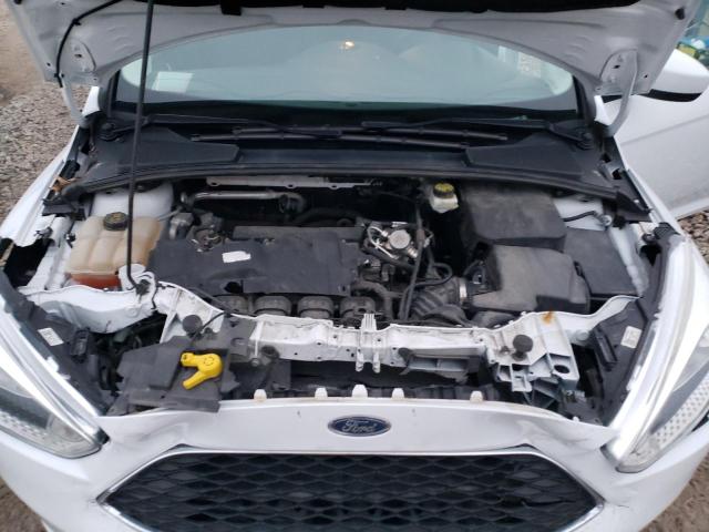 Photo 11 from auction – 2018 FORD FOCUS SE with VIN 1FADP3F24JL261967