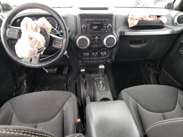 Photo 8 from auction – 2014 JEEP WRANGLER U with VIN 1C4BJWFG1EL310628