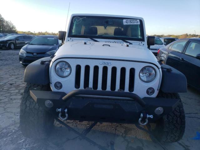 Photo 5 from auction – 2016 JEEP WRANGLER U with VIN 1C4BJWDG8GL231799