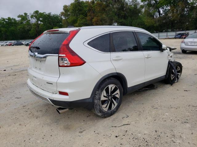 Photo 3 from auction – 2016 HONDA CR-V TOURI with VIN 5J6RM3H95GL008338