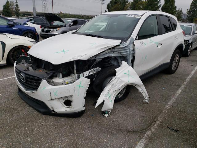 MAZDA CX-5 TOURI 2016 with VIN JM3KE2CY6G0759924 - Photo from auction