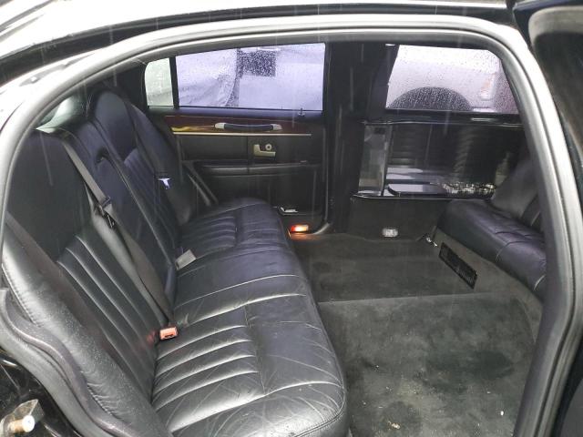 Photo 10 from auction – 2004 LINCOLN TOWN CAR E with VIN 1L1FM81W14Y667731