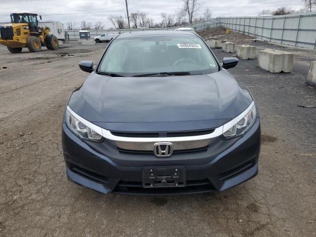 Photo 5 from auction – 2018 HONDA CIVIC LX with VIN 19XFC2F59JE006677