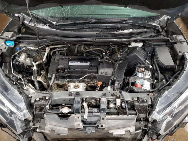 Photo 12 from auction – 2015 HONDA CR-V EX with VIN 2HKRM4H59FH680432