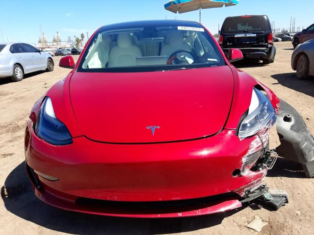 Photo 5 from auction – 2022 TESLA MODEL 3 with VIN 5YJ3E1EB0NF128777