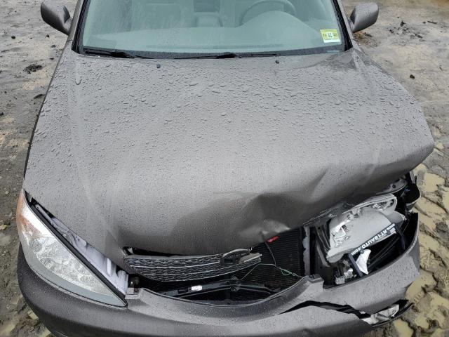 Photo 11 from auction – 2004 TOYOTA CAMRY LE with VIN 4T1BF32K34U571905