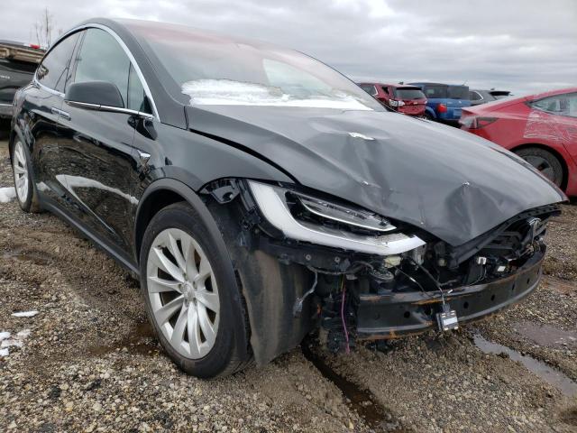 Photo 4 from auction – 2017 TESLA MODEL X with VIN 5YJXCBE29HF053871