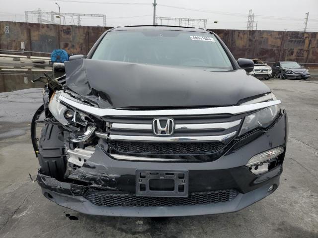 Photo 5 from auction – 2016 HONDA PILOT EXL with VIN 5FNYF5H89GB005394