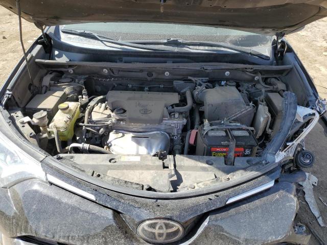 Photo 11 from auction – 2018 TOYOTA RAV4 LE with VIN 2T3BFREV7JW761296