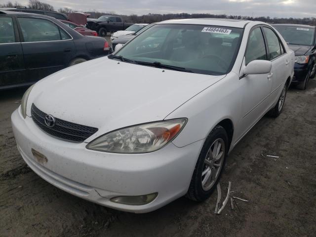 TOYOTA CAMRY LE 2003 with VIN 4T1BF30K83U055136 - Photo from auction