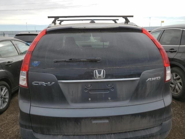 Photo 6 from auction – 2014 HONDA CR-V EXL with VIN 2HKRM4H73EH617763