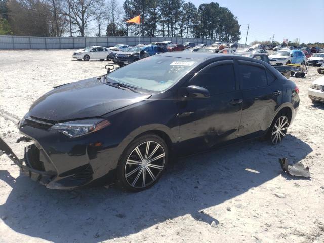 TOYOTA COROLLA L 2017 with VIN 5YFBURHE3HP735588 - Photo from auction