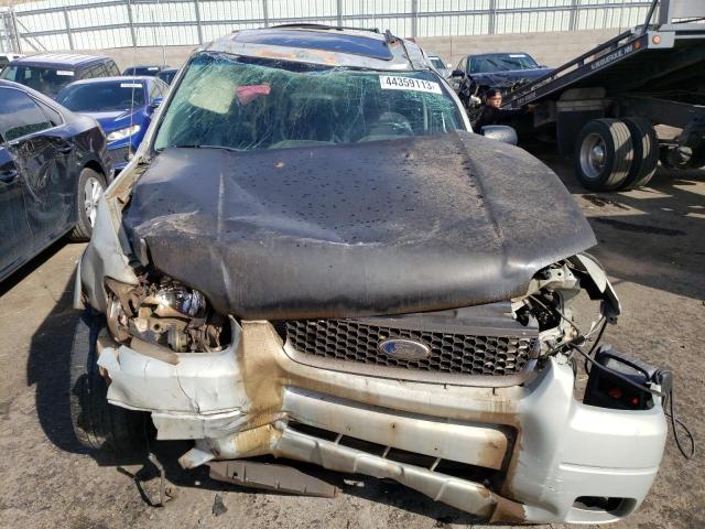 Photo 12 from auction – 2003 FORD ESCAPE LIM with VIN 1FMCU04163KE14893