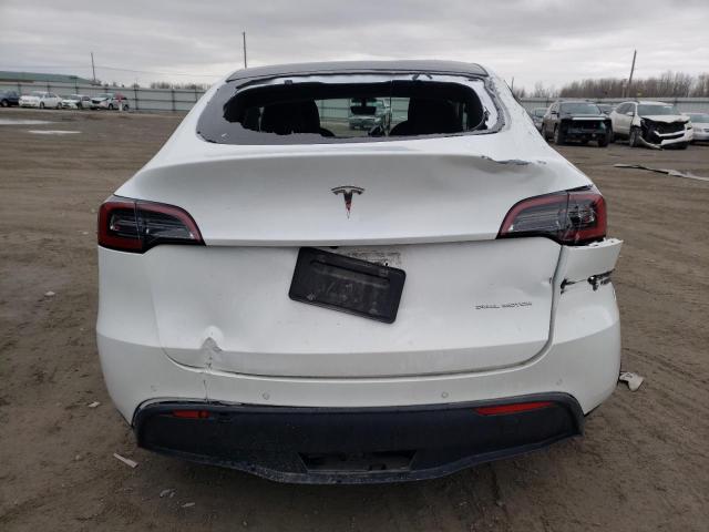 Photo 6 from auction – 2022 TESLA MODEL Y with VIN 7SAYGAEE6NF329225