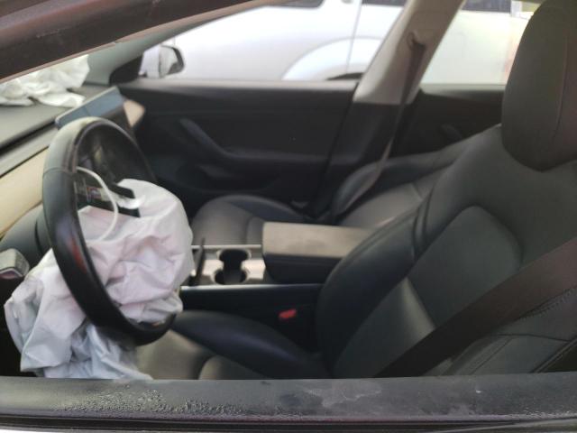 Photo 7 from auction – 2018 TESLA MODEL 3 with VIN 5YJ3E1EAXJF048999