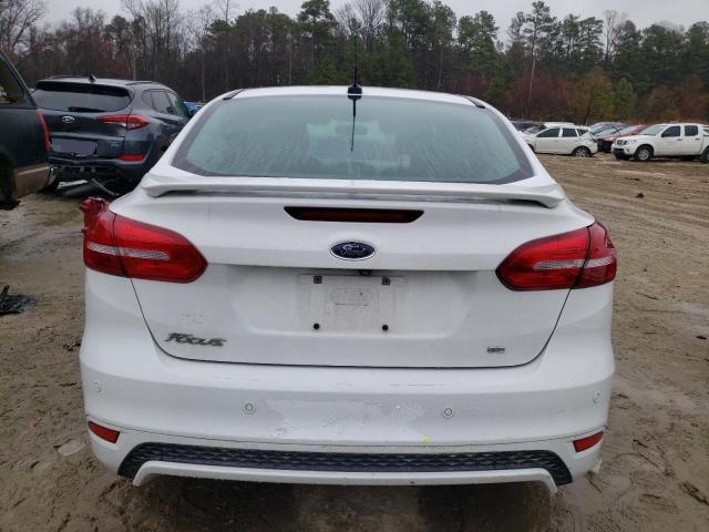 Photo 6 from auction – 2015 FORD FOCUS SE with VIN 1FADP3F21FL209493