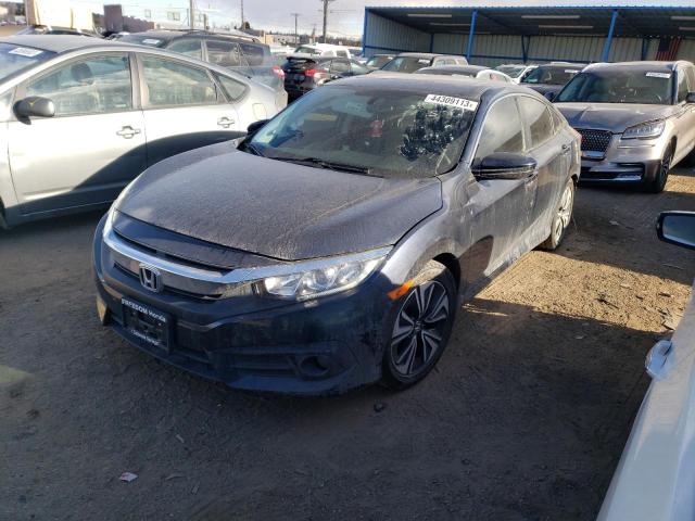 HONDA CIVIC EX 2018 with VIN JHMFC1F32JX018063 - Photo from auction
