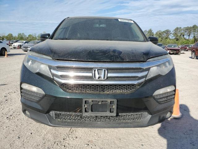 Photo 5 from auction – 2016 HONDA PILOT with VIN 5FNYF5H58GB042703