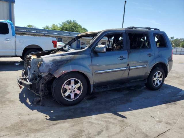 Photo 1 from auction – 2010 HONDA PILOT TOUR with VIN 5FNYF4H95AB031033