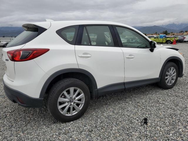 Photo 3 from auction – 2015 MAZDA CX-5 SPORT with VIN JM3KE2BE2F0507979
