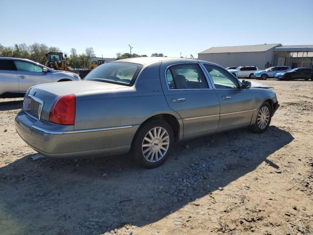 Photo 3 from auction – 2004 LINCOLN TOWN CAR E with VIN 1LNHM81W74Y645966