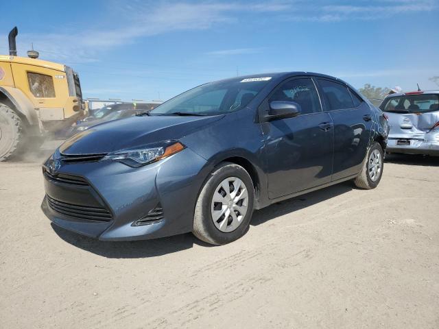 TOYOTA COROLLA L 2019 with VIN 2T1BURHEXKC214875 - Photo from auction