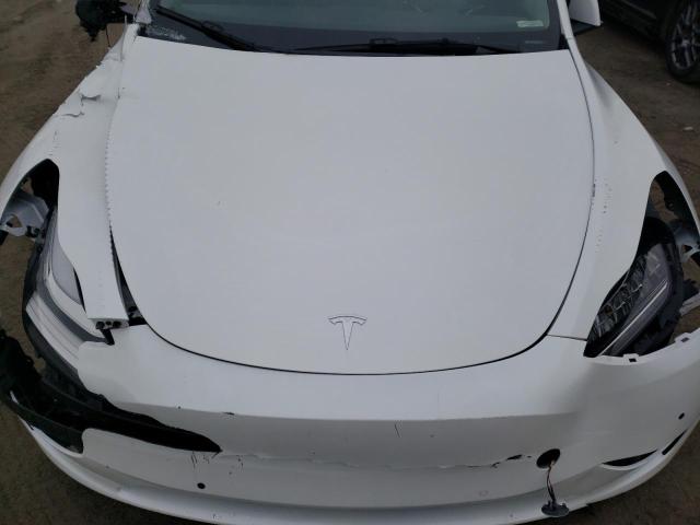 Foto 11 de la subasta – 2022 TESLA MODEL Y con VIN 7SAYGAEE6NF329225