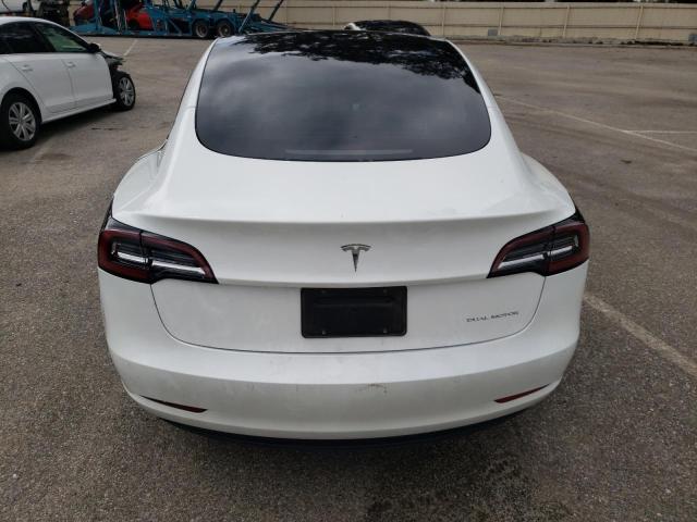 Photo 6 from auction – 2021 TESLA MODEL 3 with VIN 5YJ3E1EBXMF999409