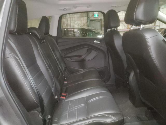 Photo 11 from auction – 2014 FORD ESCAPE TIT with VIN 1FMCU9J98EUD74368